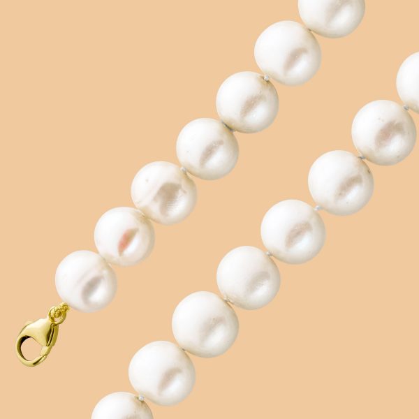 Perlenkette – Süßwasserzuchtperlenkette leicht unrund rosé-leicht creme Gelbgoldkarabiner 585